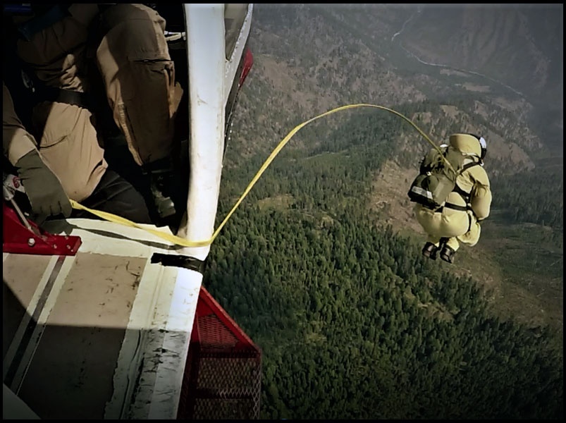 Aerial view of firefighter jumping from a plane